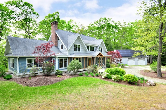 30 Holcomb Rdg, Granby, CT 06090 - shingle-style home featuring a porch, an outdoor structure, a chimney, a garage, and a front yard