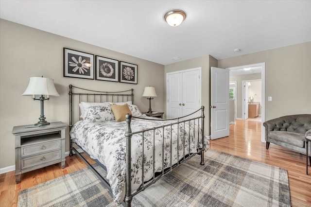6 Mill Pond Ln Unit A, Simsbury, CT 06070 - bedroom featuring wood finished floors, baseboards, and a closet