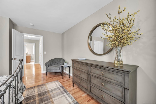 6 Mill Pond Ln Unit A, Simsbury, CT 06070 - hall featuring light wood finished floors, baseboards, and an upstairs landing