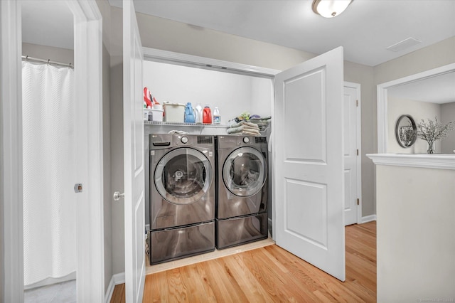 6 Mill Pond Ln Unit A, Simsbury, CT 06070 - laundry area with washer and clothes dryer, wood finished floors, and baseboards