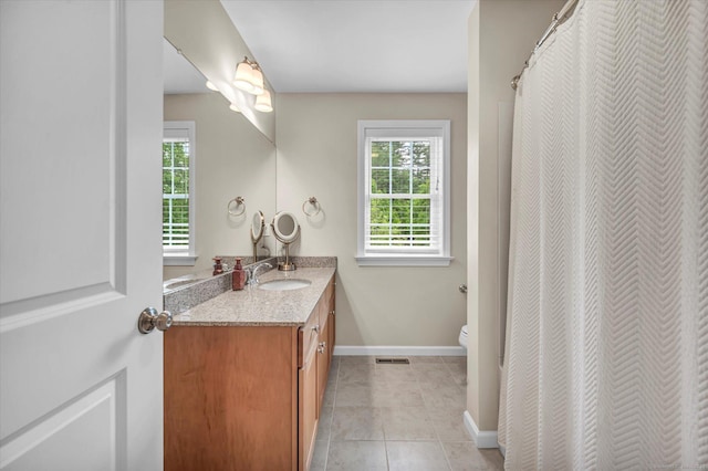 6 Mill Pond Ln Unit A, Simsbury, CT 06070 - full bath with toilet, tile patterned flooring, baseboards, and vanity