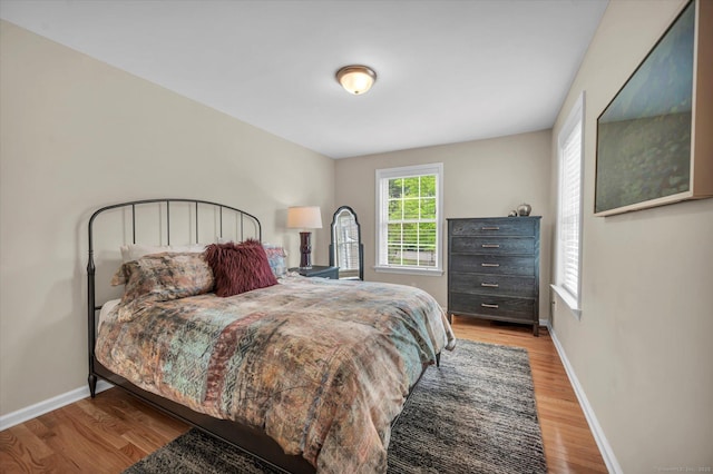 6 Mill Pond Ln Unit A, Simsbury, CT 06070 - bedroom featuring wood finished floors and baseboards