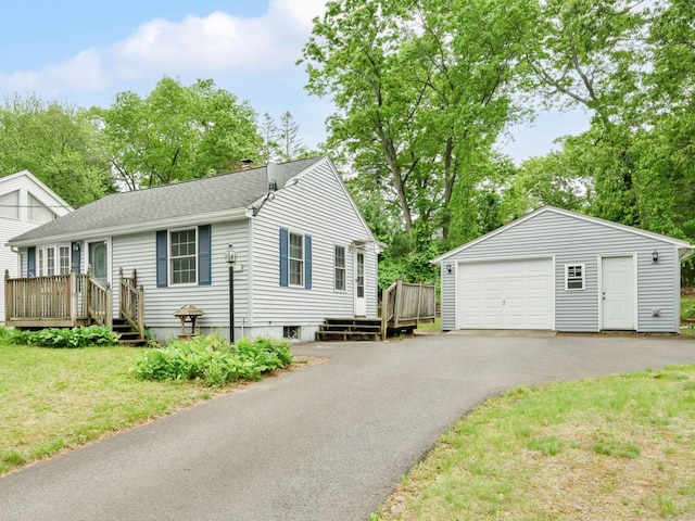 40 W View Dr, Enfield, CT 06082 - ranch-style home featuring a garage, an outbuilding, asphalt driveway, a wooden deck, and a shingled roof