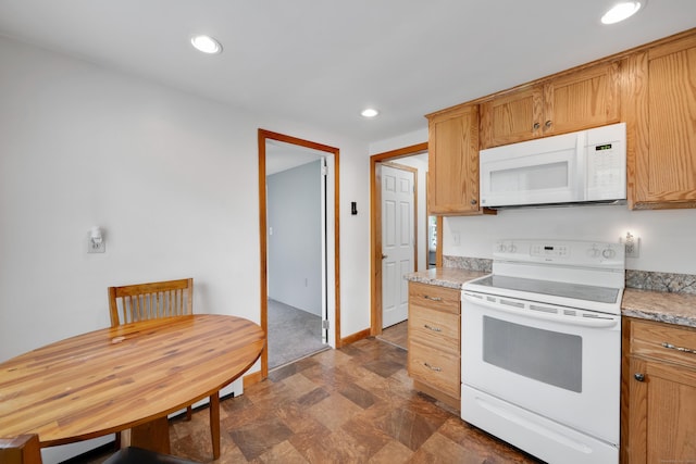 40 W View Dr, Enfield, CT 06082 - kitchen with white appliances, light countertops, recessed lighting, and stone finish flooring