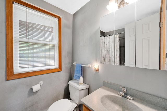 40 W View Dr, Enfield, CT 06082 - full bathroom featuring vanity, toilet, and a shower with shower curtain