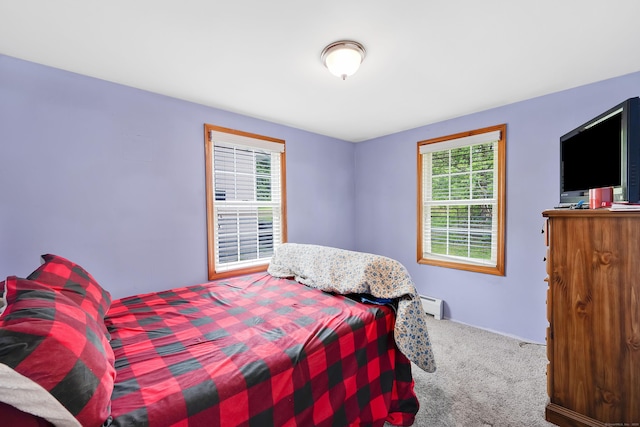 40 W View Dr, Enfield, CT 06082 - carpeted bedroom featuring multiple windows and a baseboard heating unit