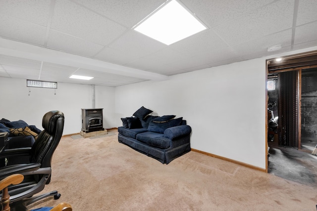 40 W View Dr, Enfield, CT 06082 - carpeted office space with a wood stove, a paneled ceiling, and baseboards