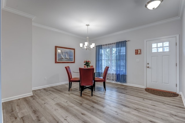 2 Linden Ct, Southington, CT 06489 - dining space featuring a chandelier, light wood finished floors, ornamental molding, and baseboards