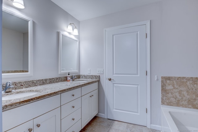 2 Linden Ct, Southington, CT 06489 - bathroom with double vanity, a bath, baseboards, and tile patterned floors