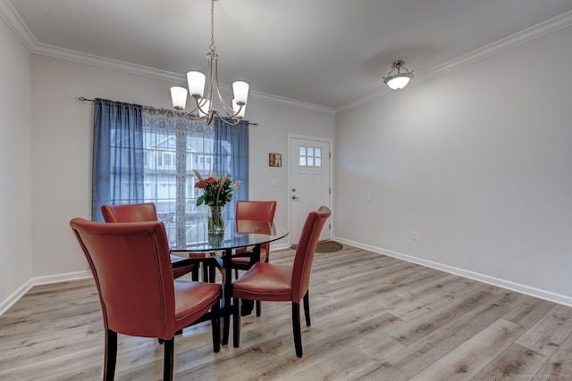 2 Linden Ct, Southington, CT 06489 - dining room with a chandelier, light wood-style floors, crown molding, and baseboards
