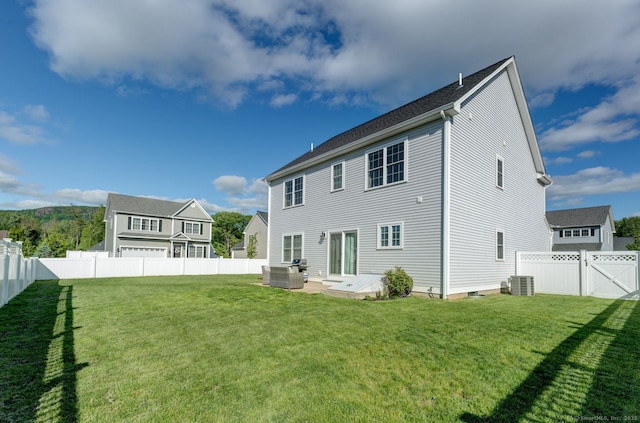 2 Linden Ct, Southington, CT 06489 - rear view of house featuring central AC unit and a patio area