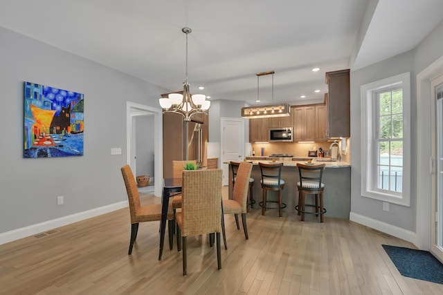 17 Paper Mill Rd, Marlborough, CT 06447 - dining space featuring recessed lighting, baseboards, a chandelier, and light wood-type flooring