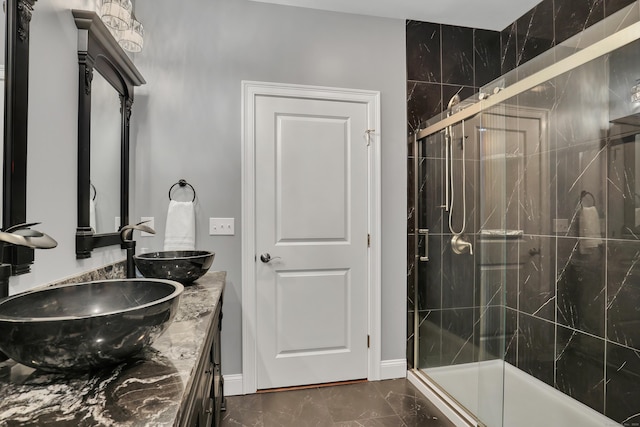 17 Paper Mill Rd, Marlborough, CT 06447 - full bath featuring marble look tile flooring, a shower stall, and double vanity