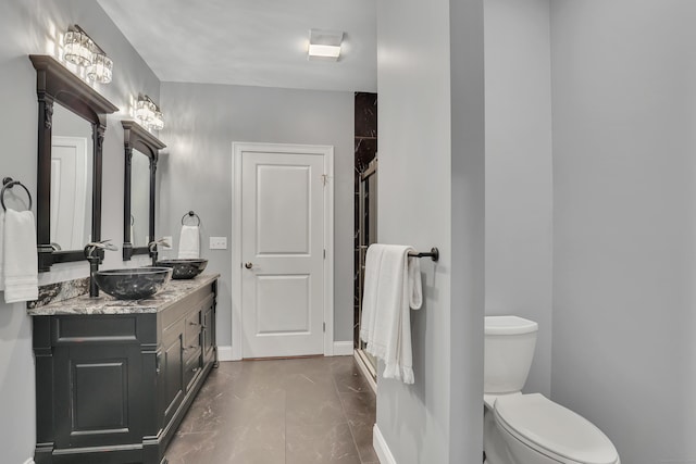 17 Paper Mill Rd, Marlborough, CT 06447 - full bathroom featuring vanity, a shower stall, toilet, and baseboards