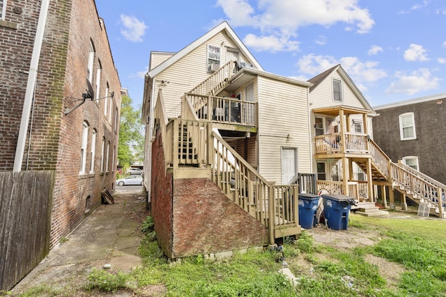 171 Frank St, New Haven, CT 06519 - rear view of house featuring stairs