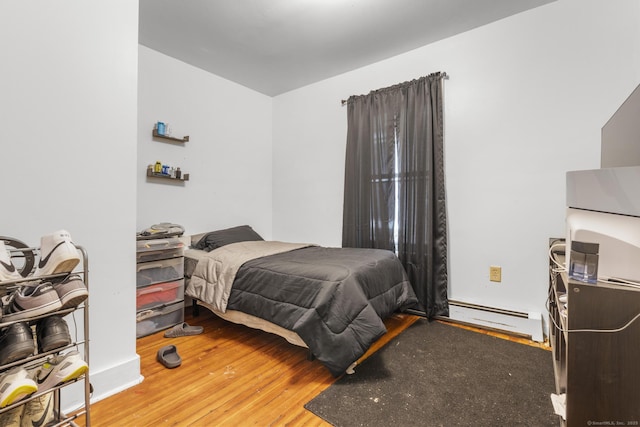 171 Frank St, New Haven, CT 06519 - bedroom featuring a baseboard heating unit and wood finished floors