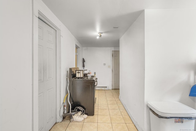 171 Frank St, New Haven, CT 06519 - kitchen with light tile patterned floors and baseboards