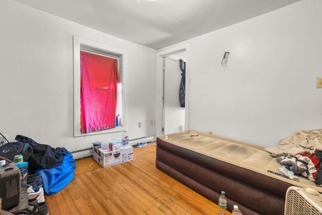 171 Frank St, New Haven, CT 06519 - bedroom with hardwood / wood-style floors and a baseboard radiator