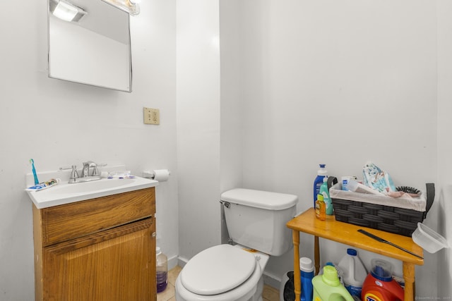 171 Frank St, New Haven, CT 06519 - bathroom with toilet, vanity, and baseboards