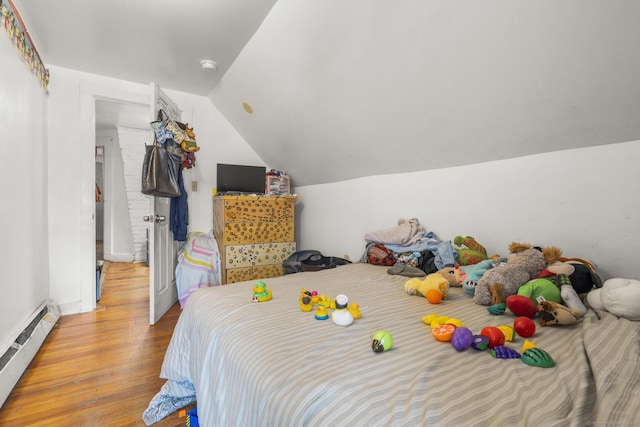 171 Frank St, New Haven, CT 06519 - bedroom with baseboard heating, wood finished floors, and vaulted ceiling
