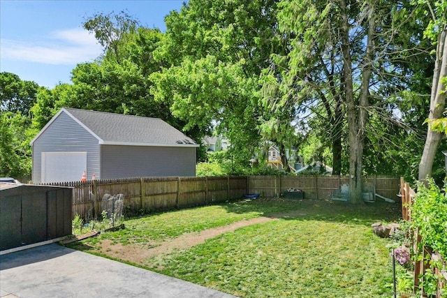 76 Geer Ave, Norwich, CT 06360 - view of yard with a garage and an outbuilding