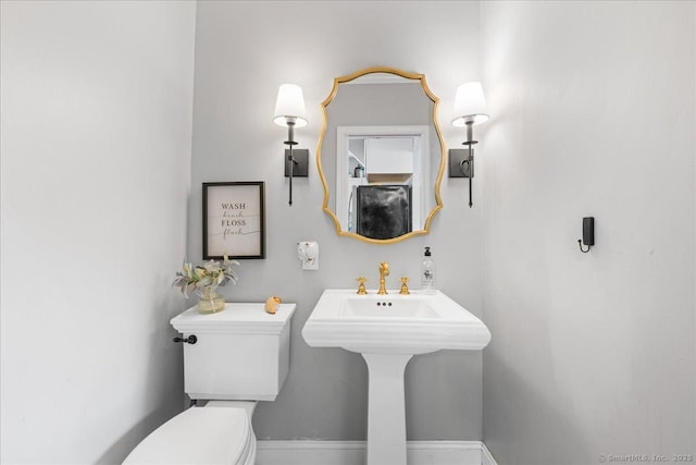 76 Geer Ave, Norwich, CT 06360 - bathroom with toilet and baseboards