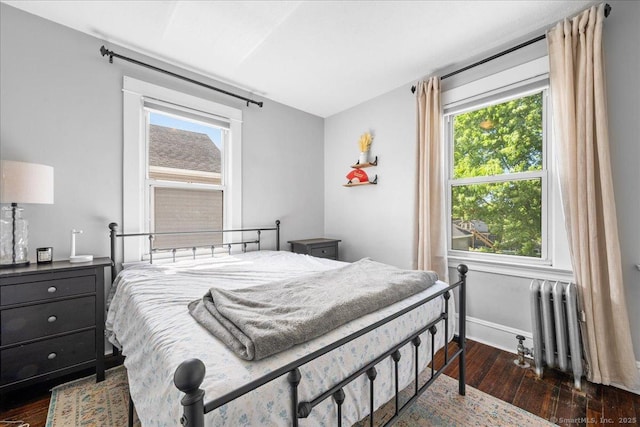 76 Geer Ave, Norwich, CT 06360 - bedroom featuring radiator heating unit, wood-type flooring, and baseboards