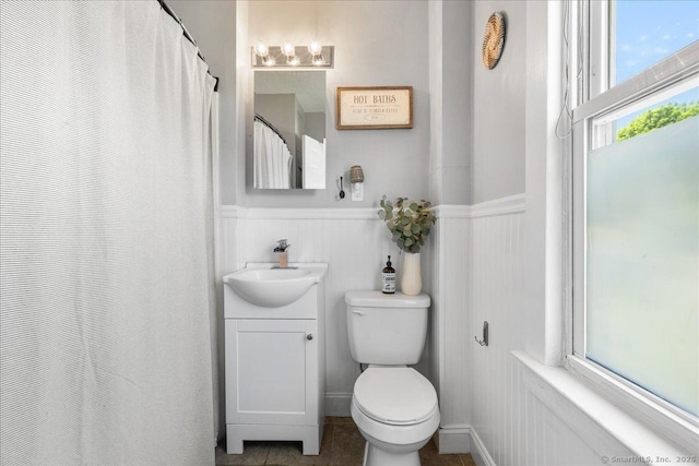 76 Geer Ave, Norwich, CT 06360 - full bath with a wainscoted wall, vanity, and toilet