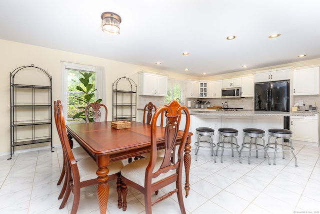 17 Saint George Pl Unit 17, Newtown, CT 06482 - dining area with light marble finish floors, plenty of natural light, and recessed lighting
