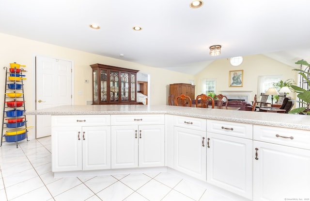 17 Saint George Pl Unit 17, Newtown, CT 06482 - kitchen featuring light countertops, recessed lighting, vaulted ceiling, white cabinets, and open floor plan