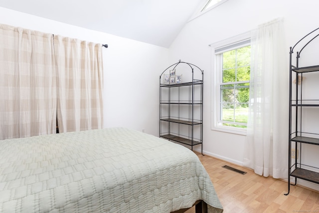 17 Saint George Pl Unit 17, Newtown, CT 06482 - bedroom with lofted ceiling, light wood finished floors, and baseboards