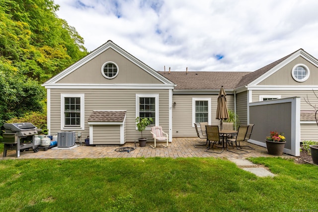 17 Saint George Pl Unit 17, Newtown, CT 06482 - back of house with a lawn, a patio area, and cooling unit