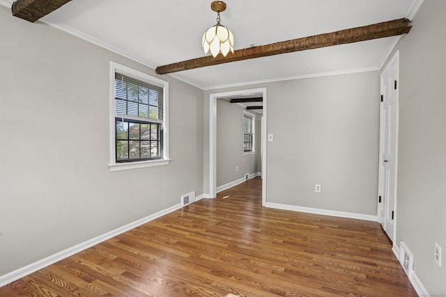 1975 Huntington Rd, Stratford, CT 06614 - unfurnished room featuring beam ceiling and wood finished floors