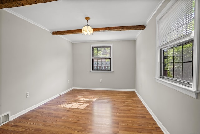 1975 Huntington Rd, Stratford, CT 06614 - unfurnished room featuring wood finished floors, ornamental molding, and beamed ceiling