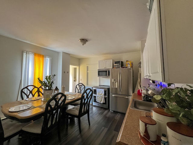 24 Willetts Ave, New London, CT 06320 - dining space with dark wood finished floors