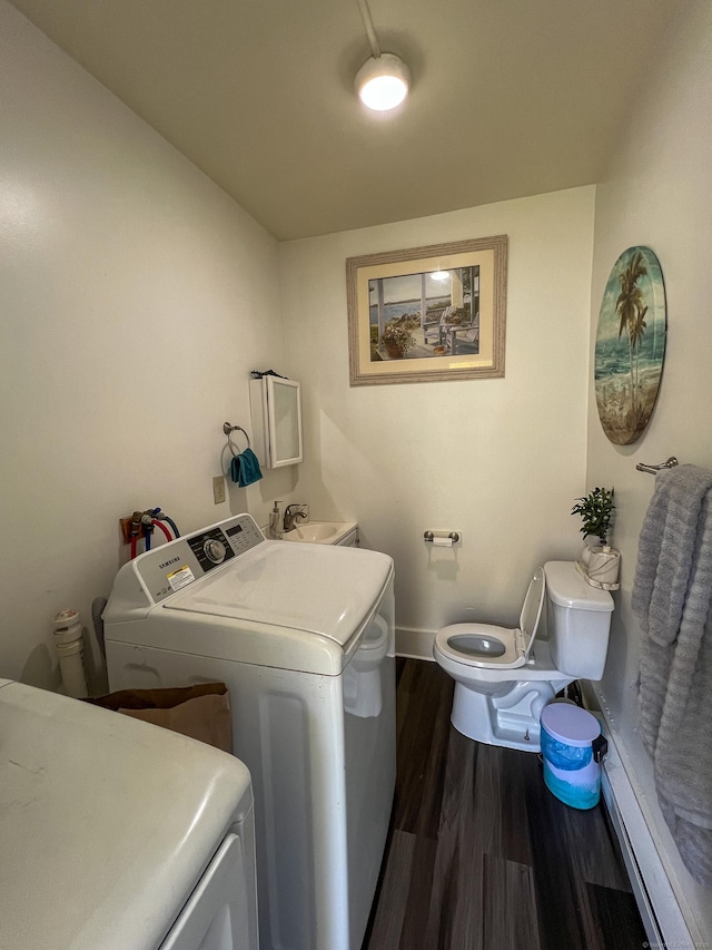 24 Willetts Ave, New London, CT 06320 - laundry area featuring washing machine and dryer and dark wood finished floors