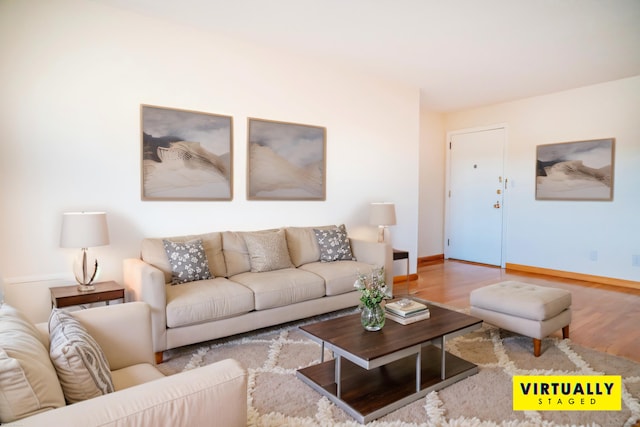 70 Grove Hill St Apt 3R, New Britain, CT 06052 - living area featuring wood finished floors and baseboards