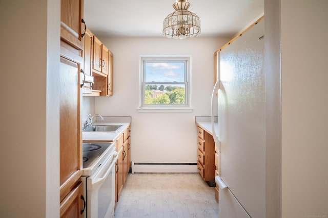 70 Grove Hill St Apt 3R, New Britain, CT 06052 - kitchen with white appliances, a baseboard heating unit, a sink, a chandelier, and light countertops