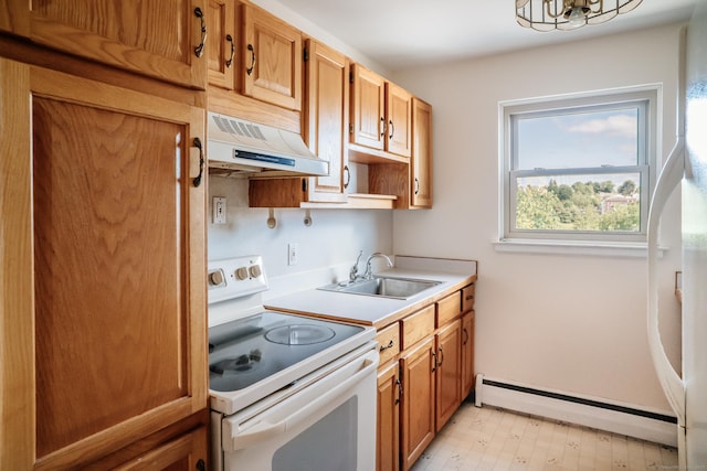 70 Grove Hill St Apt 3R, New Britain, CT 06052 - kitchen with white electric range oven, under cabinet range hood, a baseboard radiator, a sink, and light countertops