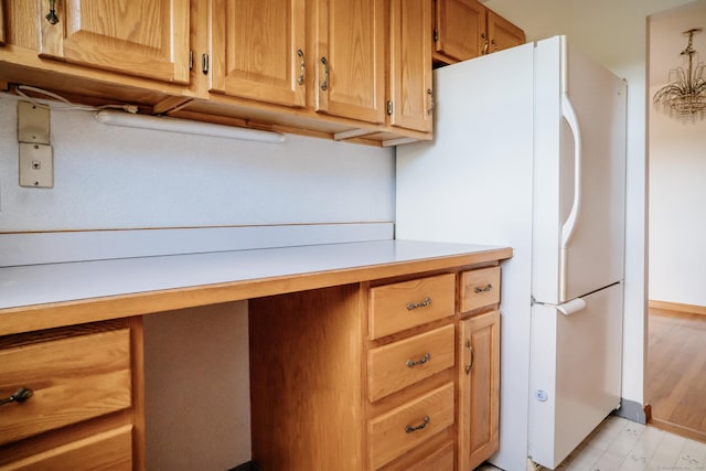 70 Grove Hill St Apt 3R, New Britain, CT 06052 - kitchen with freestanding refrigerator, light countertops, and baseboards