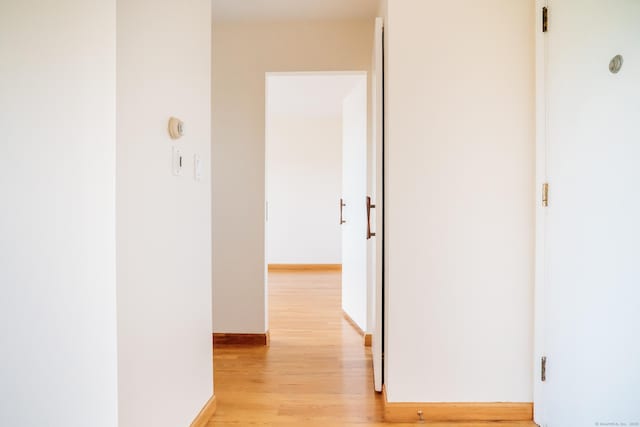 70 Grove Hill St Apt 3R, New Britain, CT 06052 - hallway featuring light wood-style flooring and baseboards