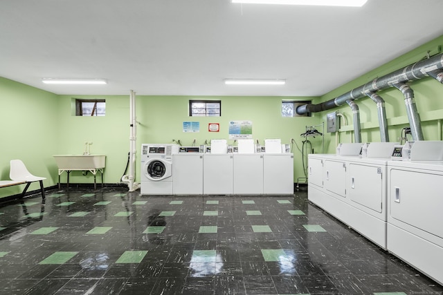 70 Grove Hill St Apt 3R, New Britain, CT 06052 - community laundry room featuring washing machine and dryer and tile patterned floors
