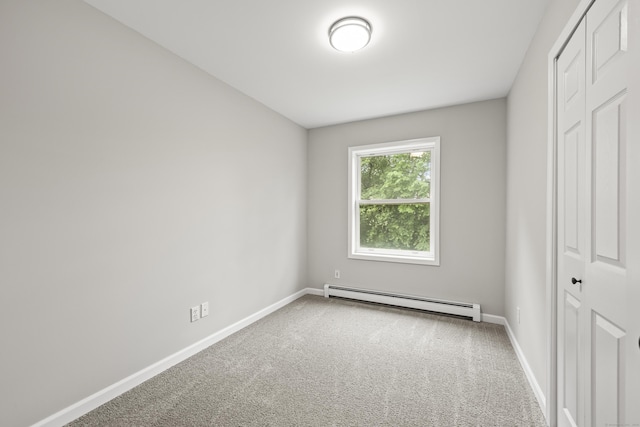63 Bidwell St, Middletown, CT 06457 - unfurnished bedroom featuring baseboard heating, a closet, carpet floors, and baseboards