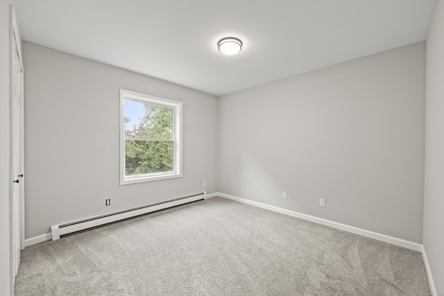 63 Bidwell St, Middletown, CT 06457 - spare room featuring baseboard heating, carpet floors, and baseboards