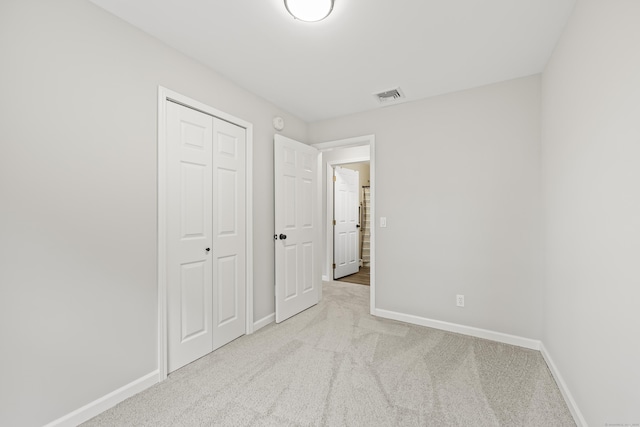 63 Bidwell St, Middletown, CT 06457 - unfurnished bedroom with baseboards, carpet, and a closet