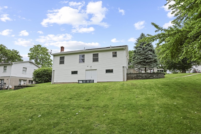 63 Bidwell St, Middletown, CT 06457 - rear view of property featuring a chimney and a lawn