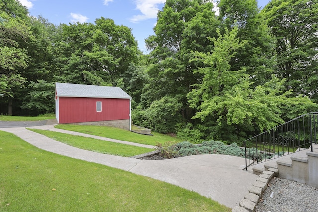 63 Bidwell St, Middletown, CT 06457 - view of green lawn with stairs and an outdoor structure