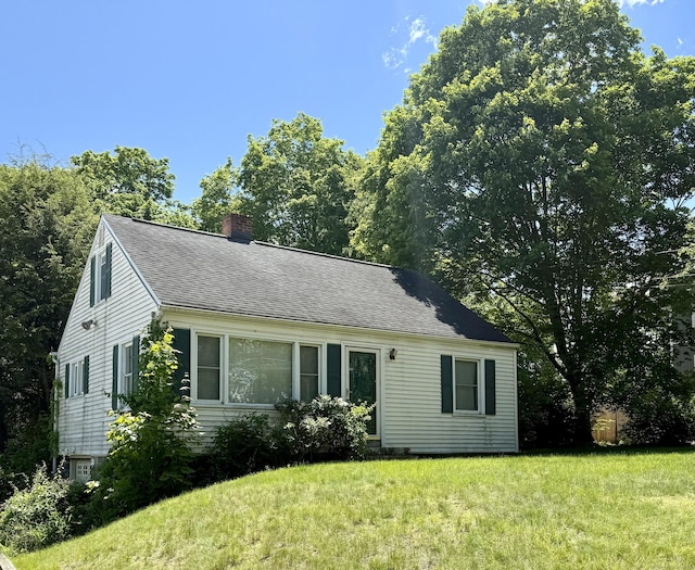 41 Beaver Brook Rd, Danbury, CT 06810 - view of front of property featuring a chimney, a front lawn, and a shingled roof