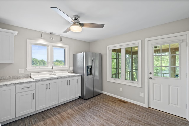 41 Beaver Brook Rd, Danbury, CT 06810 - kitchen featuring stainless steel fridge, a sink, plenty of natural light, and dark wood finished floors