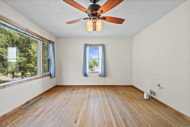 41 Beaver Brook Rd, Danbury, CT 06810 - unfurnished room featuring hardwood / wood-style flooring, a textured ceiling, baseboards, and ceiling fan